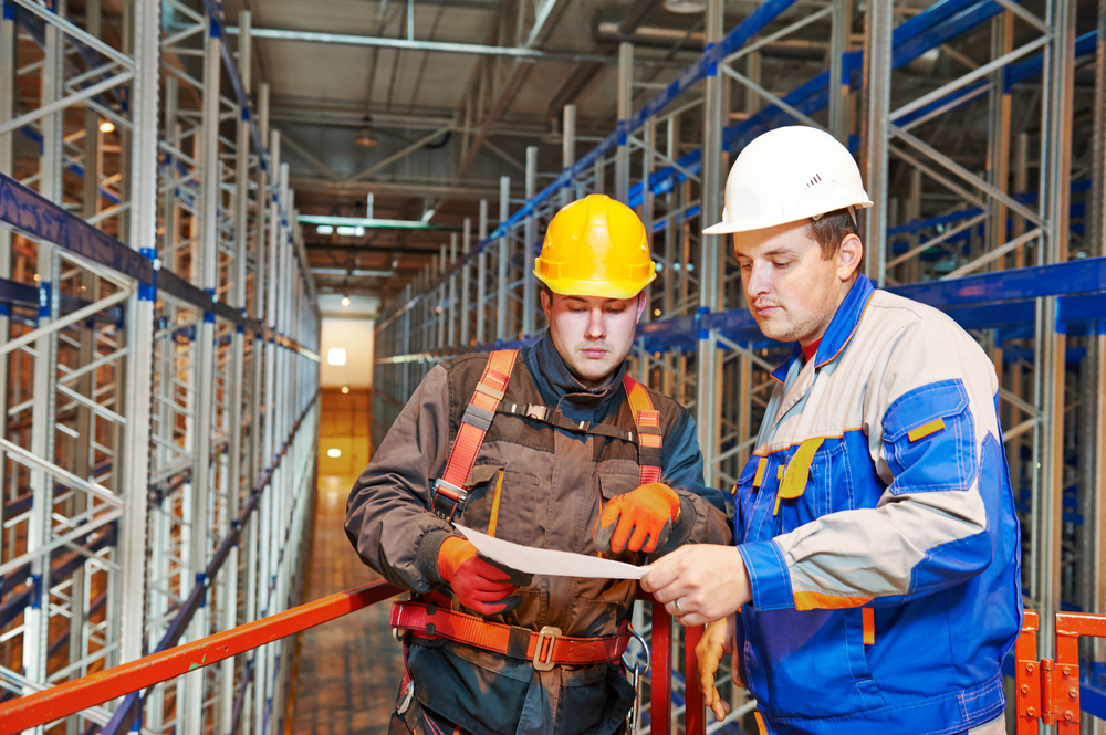 Consulting engineers in warehouse