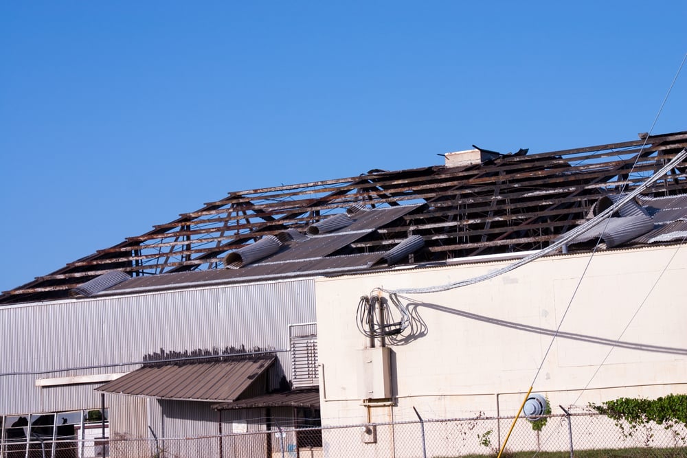 Commercial building with damaged roof