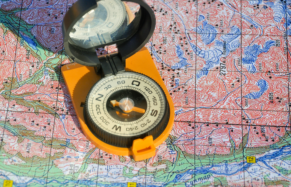 Compass-on-a-topographical-map-SS-Sergei Drozd
