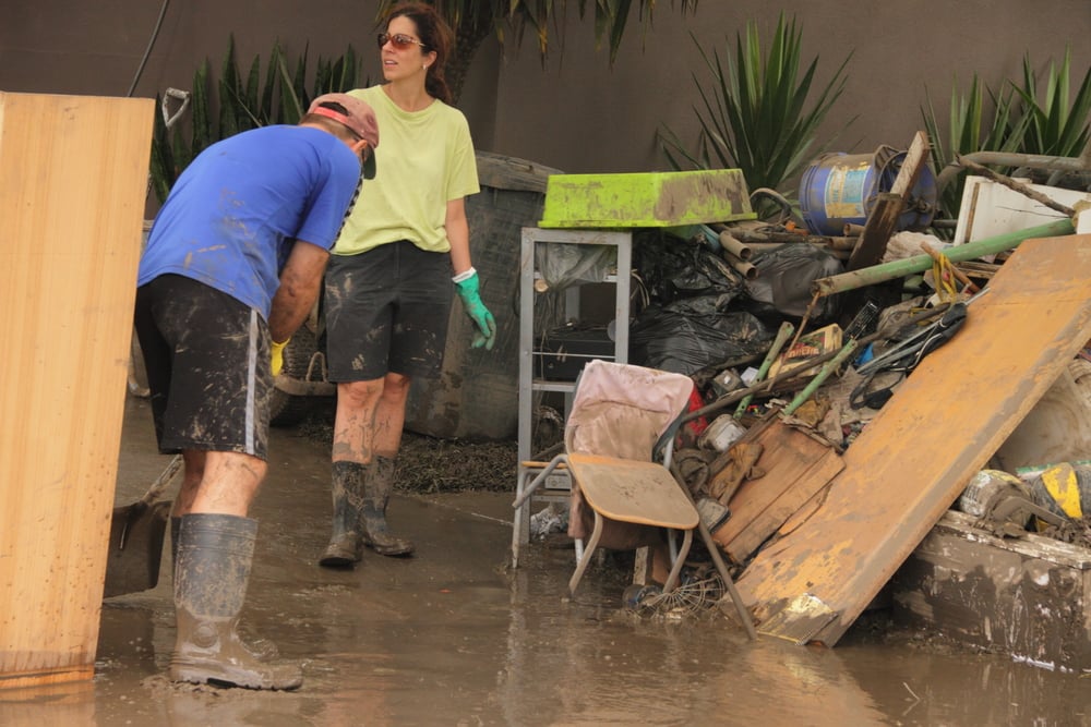 Shoveling-mud-out-of-flooded-house-SS-paintings