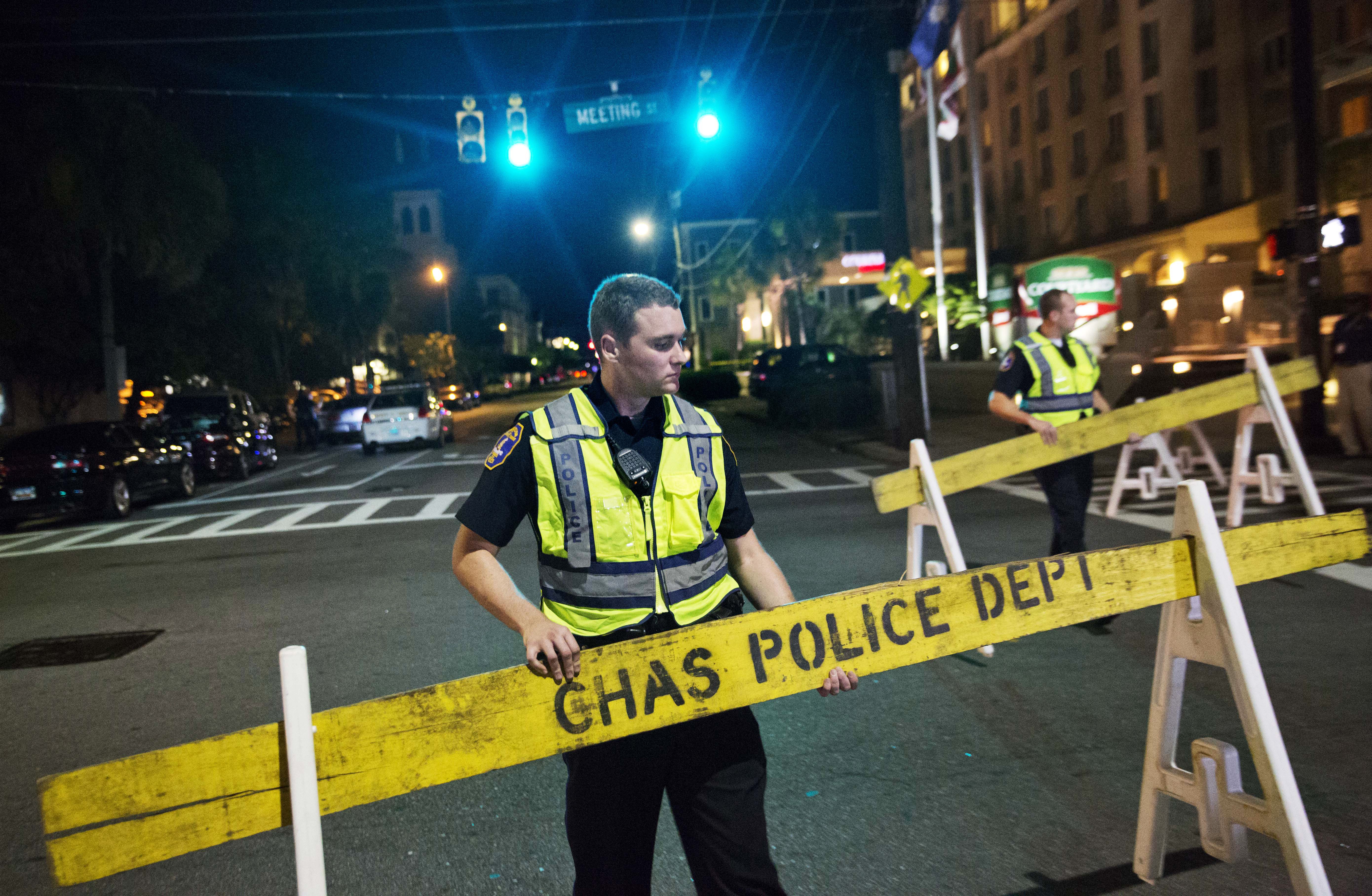 Police close off a section of Calhoun Street near the Emanuel AME Church following a shooting Wednesday, June 17, 2015, in Charleston, S.C.