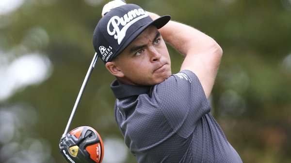 Rickie Fowler hits from the tee on the 14th hole during the first round of the Tour Championship golf tournament at East Lake Club Thursday, Sept. 24, 2015, in Atlanta. (AP Photo/John Bazemore)