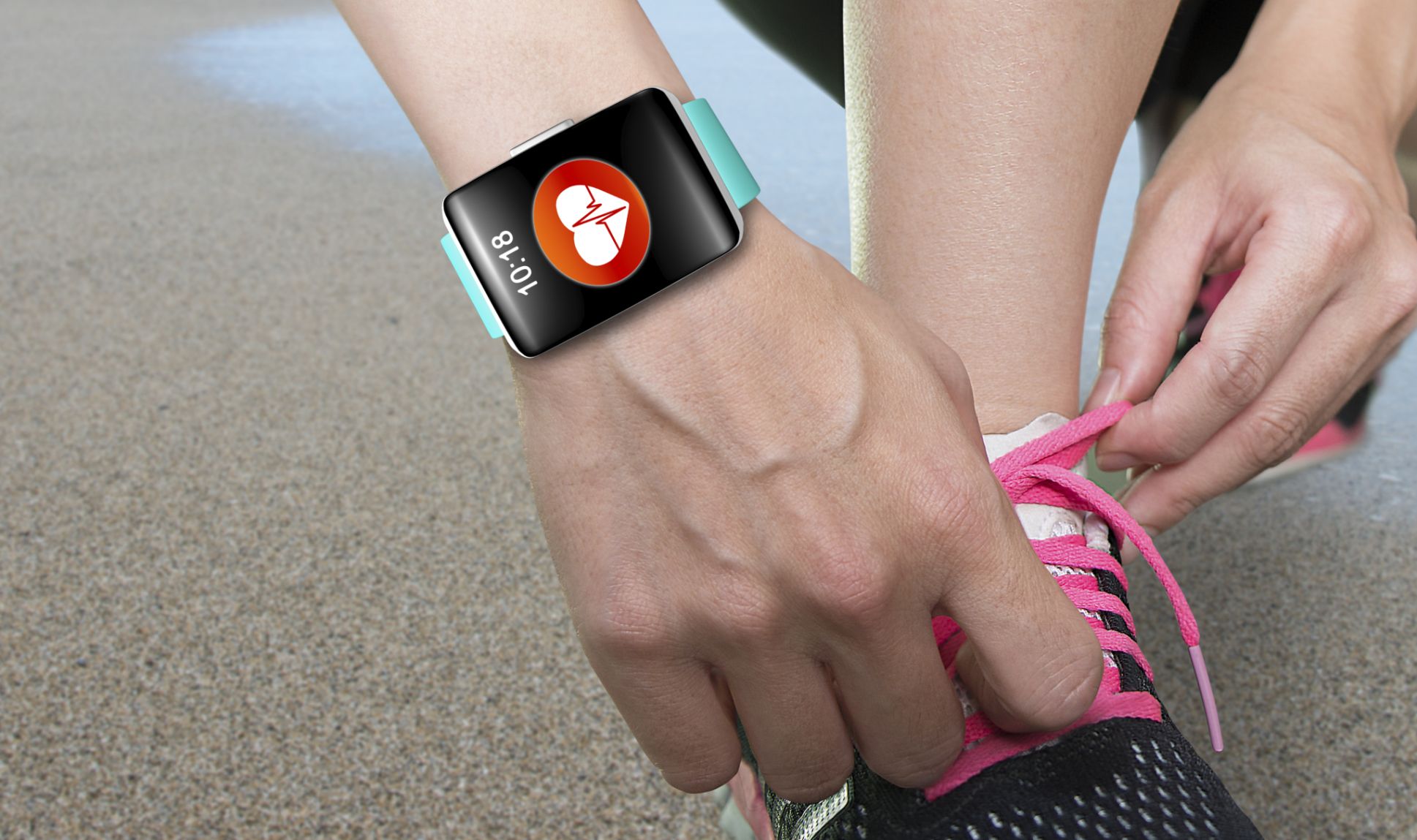 woman tying shoe with fitbit on wrist