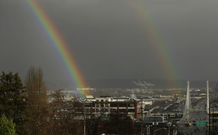A double rainbow is seen near downtown Tacoma, Wash.