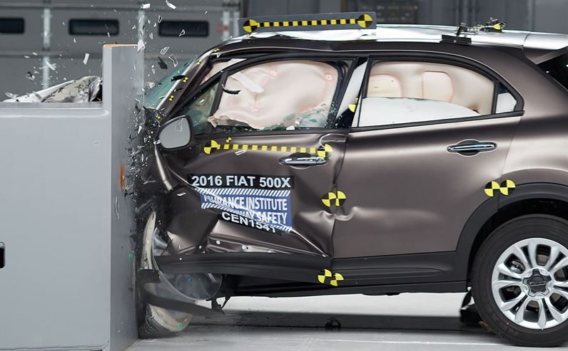 Action shot taken during the small overlap frontal crash test of the 2016 Fiat 500X