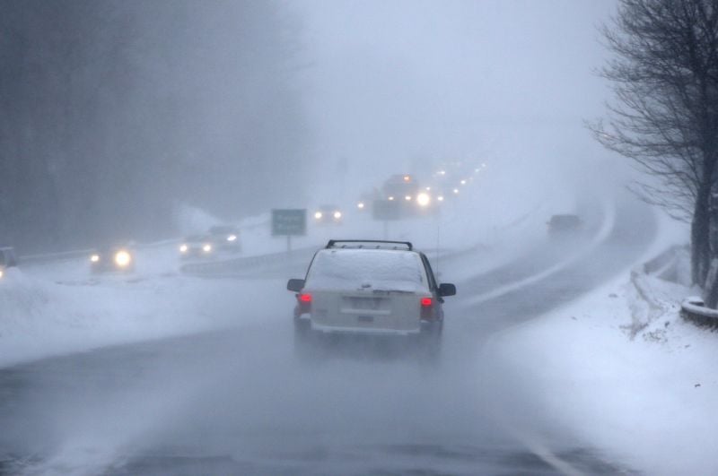 Drivers on I-295 contend with near-whiteout conditions while driving in a snow storm Monday, Feb. 2, 2015, in Yarmouth, Maine. 