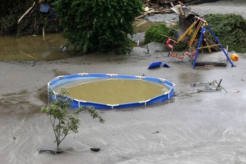 A playground and a pool is flooded by mud and water after the small town was hit by flooding in Simbach am Inn, Germany