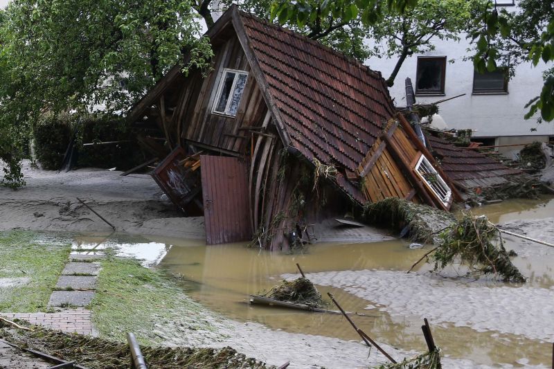 A wooden house damaged by floods in Simbach am Inn, Germany, Thursday, June 2, 2016.