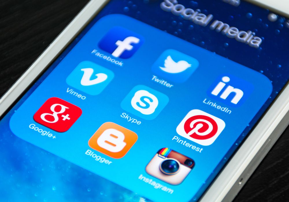 Smartphone displaying social media icons