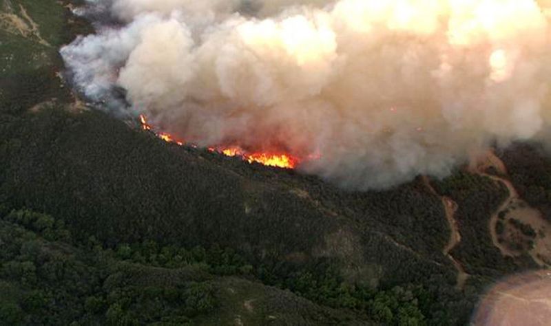 Aerial image made from video of wildfire burning in remote coastal area west of Santa Barbara