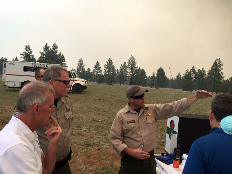  a wildfire briefing from a U.S. Forest Service official on Fort Apache Indian Reservation, Ariz.