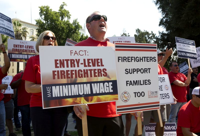  rally calling for shorter hours and higher wages to retain firefighters