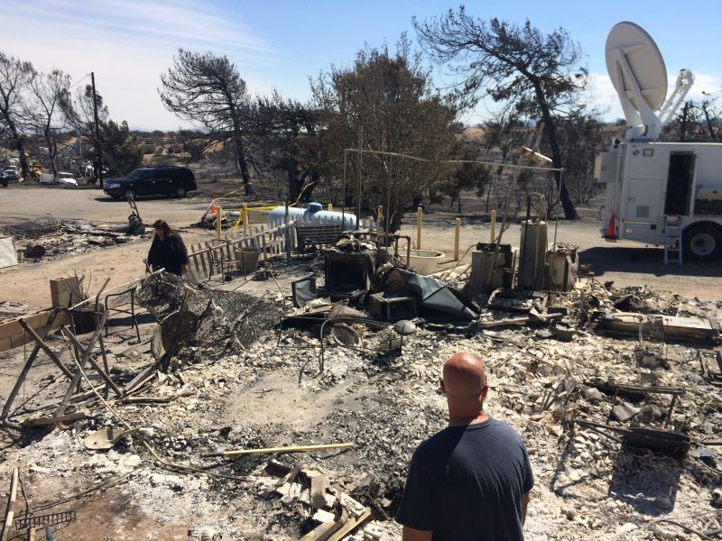 burned home in Oak Hills, Calif.