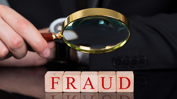fraud under a magnifying glass