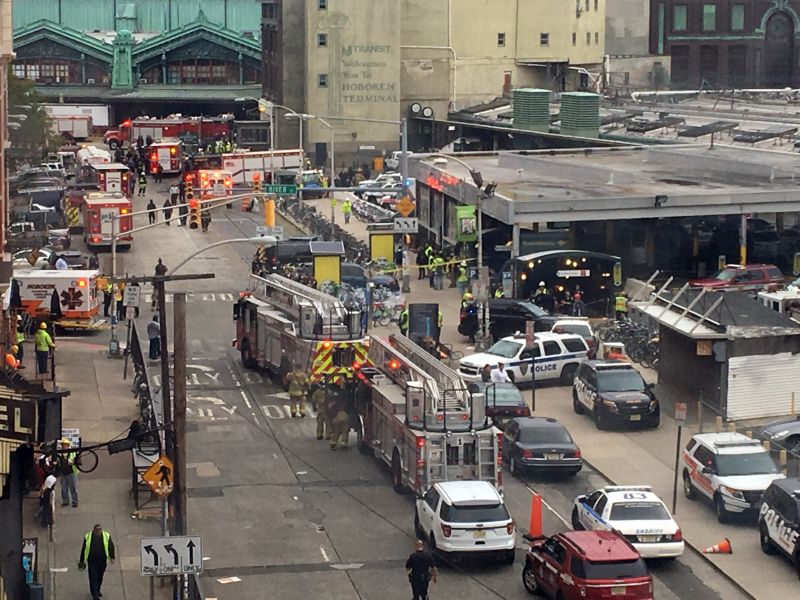 Emergency personnel arrive at the scene of a train crash in Hoboken, N.J.