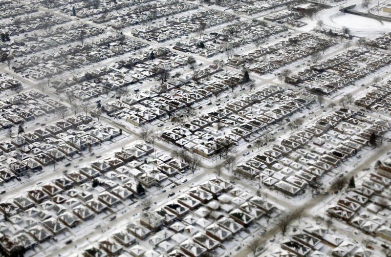 aerial view of homes covered in snow and ice in Chicago