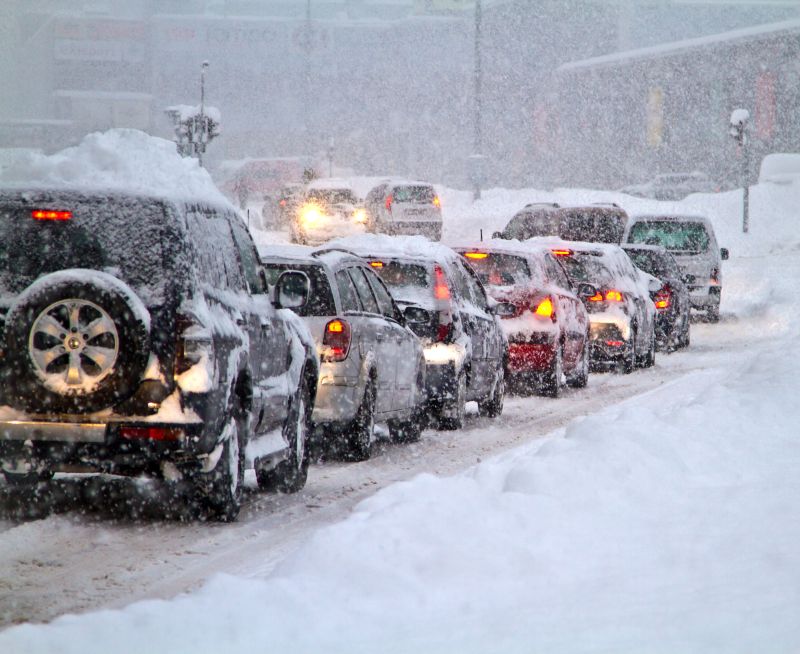 cars on road during a blizzard