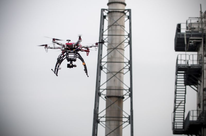 drone flying over industrial plant
