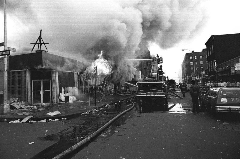 Firefighters in the Bronx battle flames in one of the many fires raging in stores throughout New York City during the blackout of 1977 