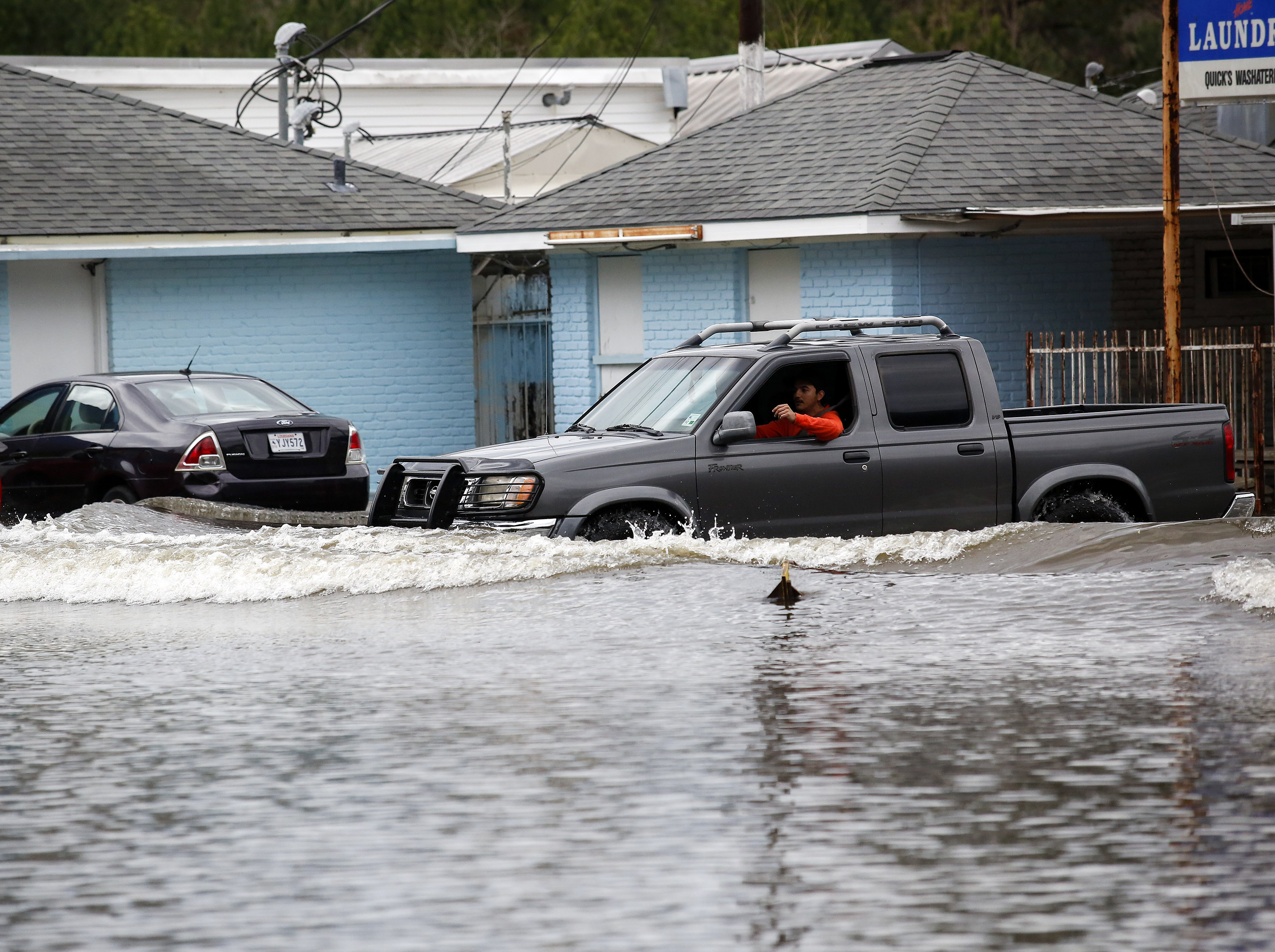 motorist trapped by flood waters in Louisiana