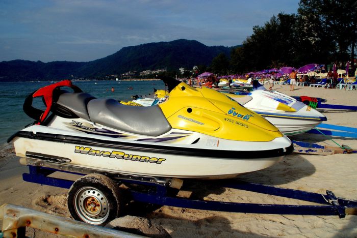 Wave runners parked on beach