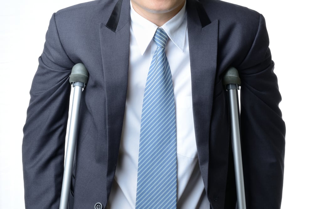 Injured man on crutches