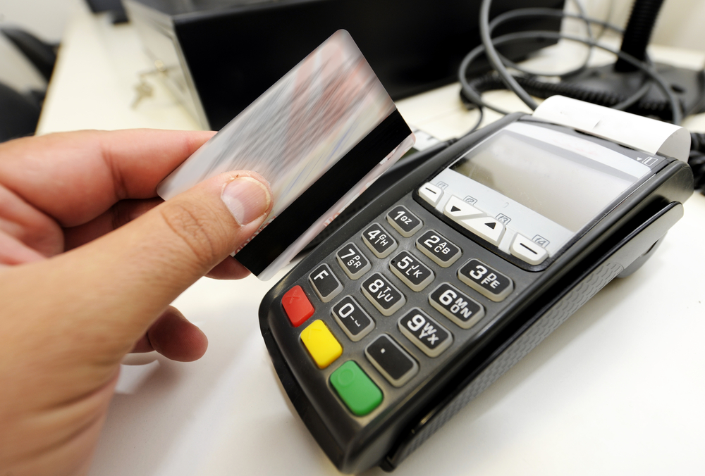 running a credit card through a card reader