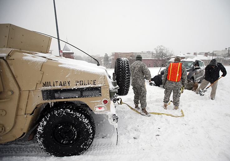 Soldiers help stranded motorist in snow storm