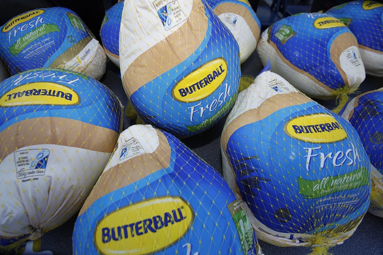 Butterball's Mt. Olive, N.C., processing facility is the largest turkey processing facility in the world, where some 2,800 employees process approximately 60,000 turkeys a day. This particular batch was distributed in 2011 to families in need by boxing promoter Don King. (AP Photo/Wilfredo Lee)